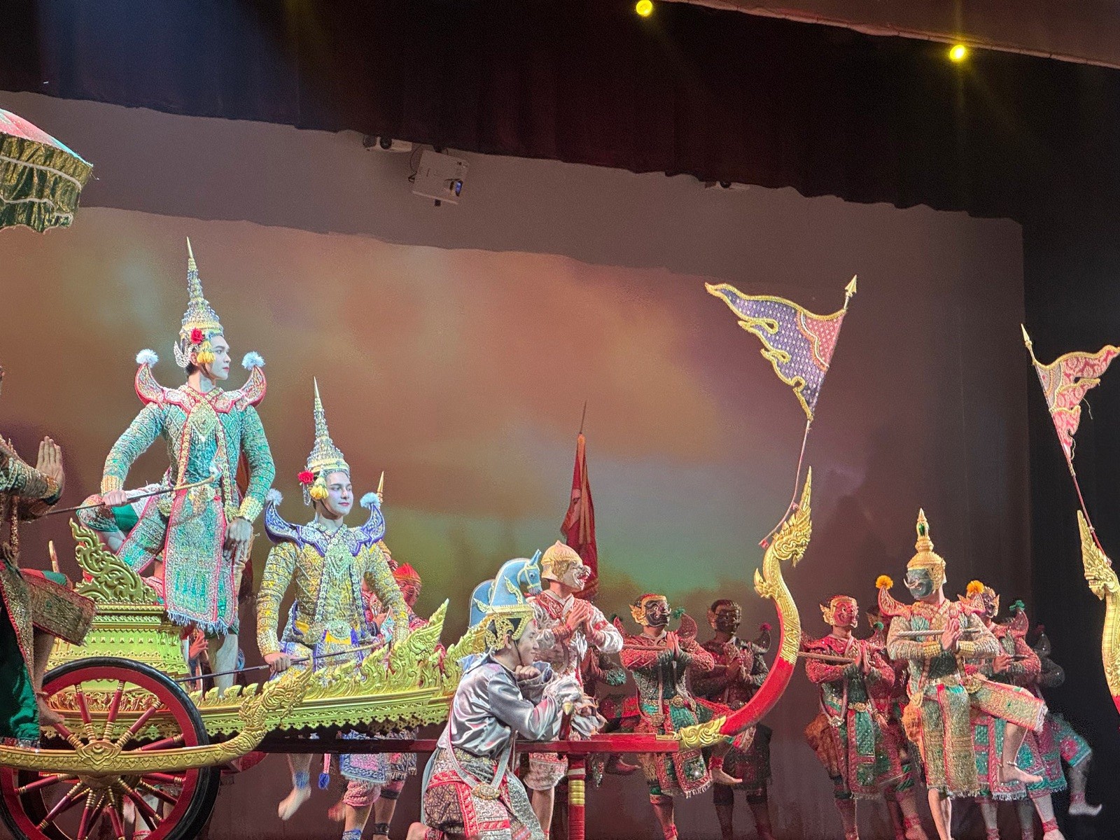 Costumed Khon performers on stage at Sala Chalermkrung Royal Theatre