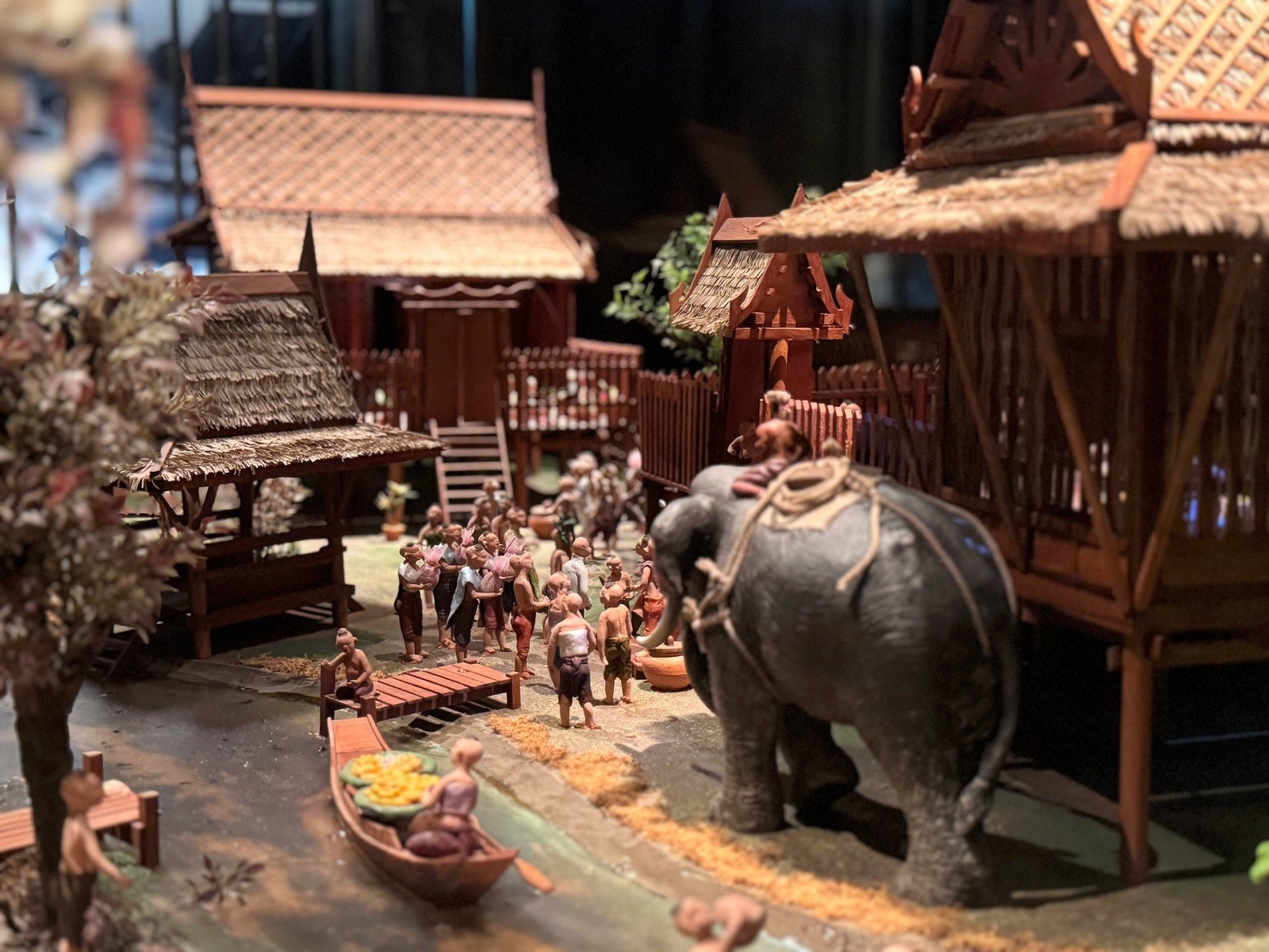 Detailed miniature model of traditional Thai life at Rattanakosin Exhibition Hall