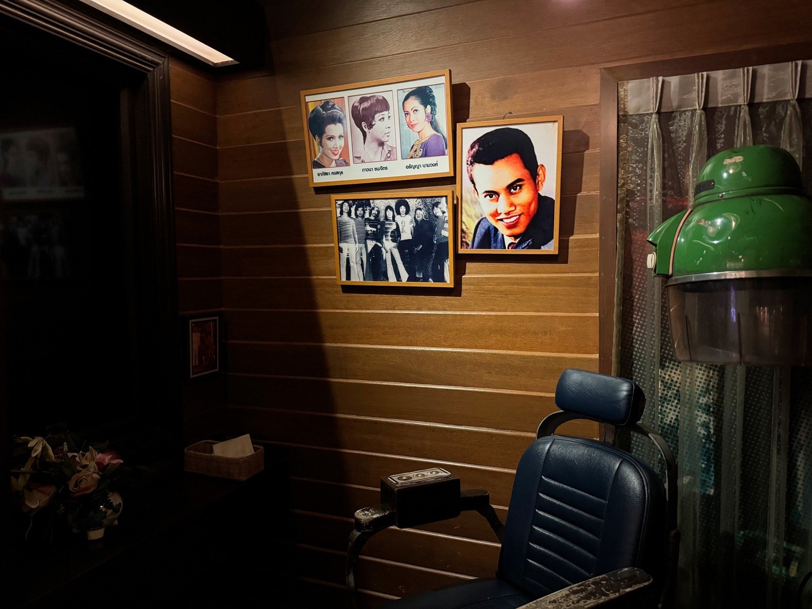 Recreated vintage barber shop with film-star portraits